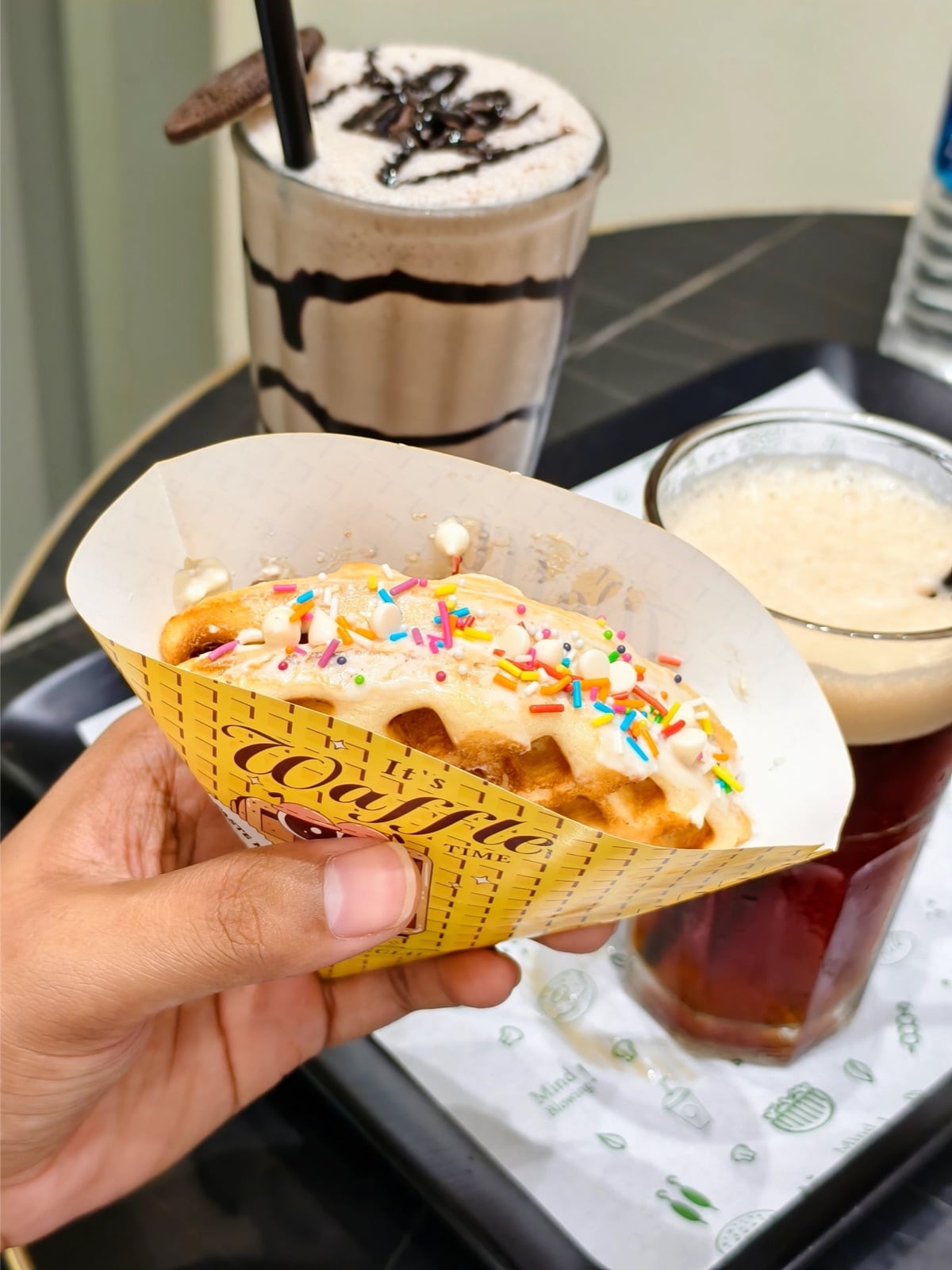 Waffle and iced drinks at a cafe
