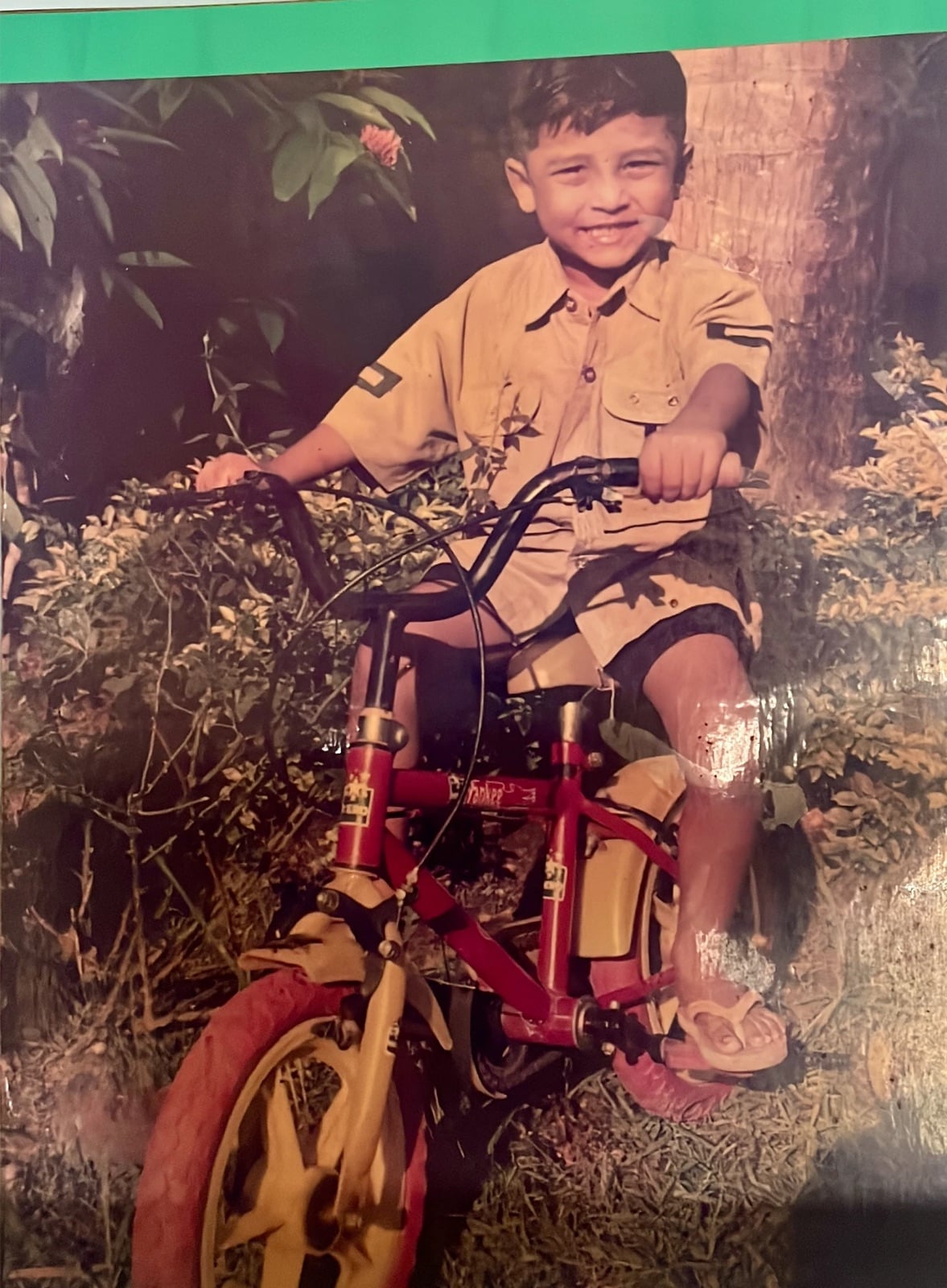 Childhood photo on a bicycle