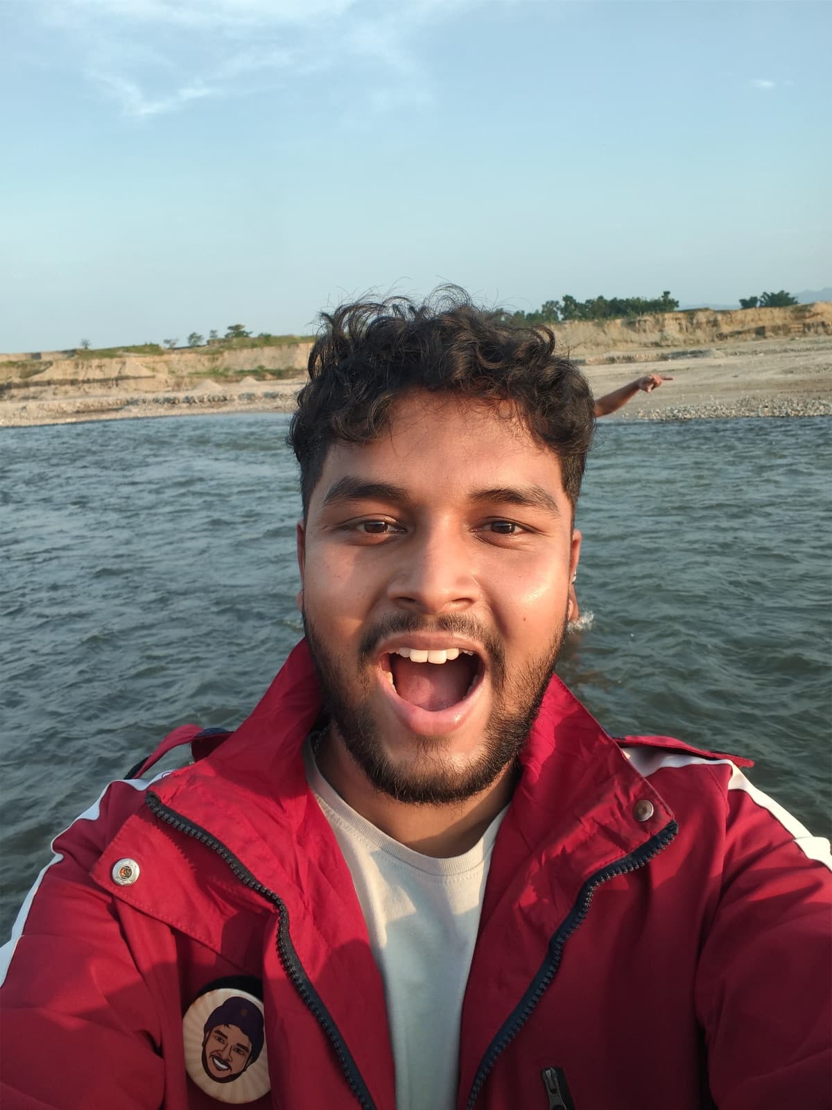 Selfie by a river at sunset